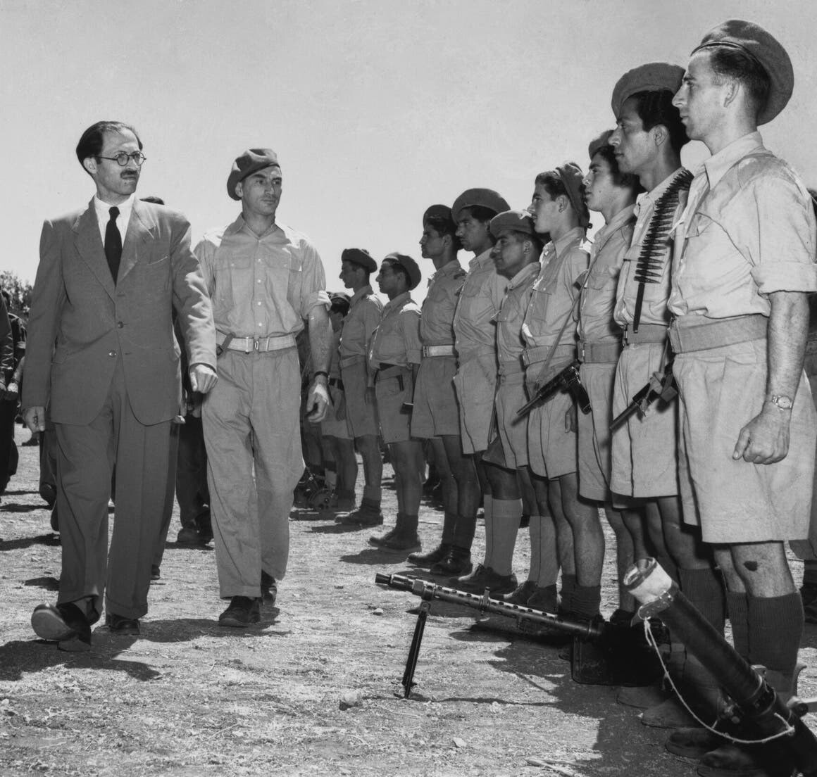 Menachem Begin (left) with members of the Irgun, August 1948