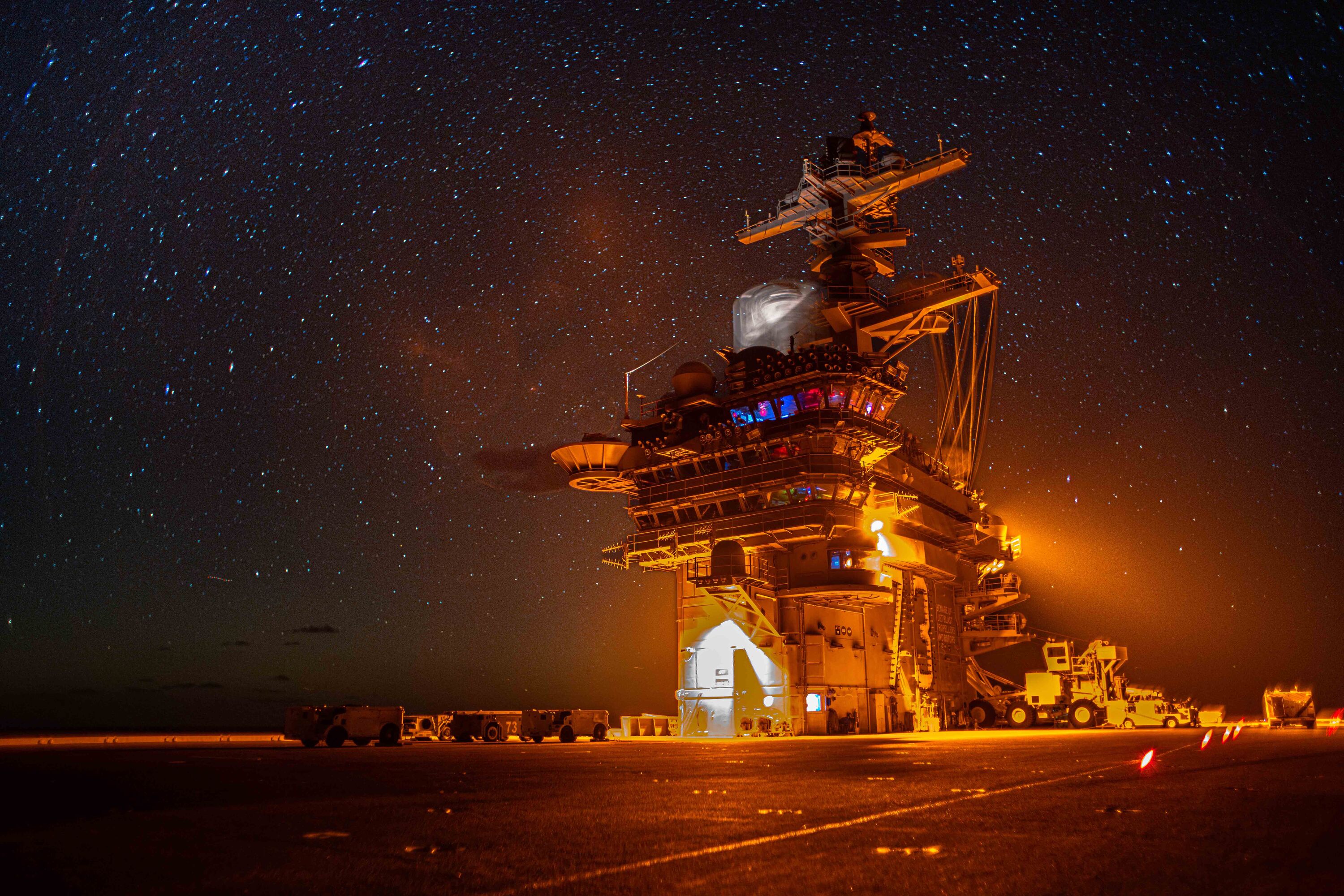 Nimitz-class aircraft carrier USS George Washington (CVN 73) transits while underway in the Philippine Sea, Dec. 10, 2025. George Washington is the U.S. Navys premier forward-deployed aircraft carrier, a long-standing symbol of the United States commitment to maintaining a free and open Indo-Pacific region, while operating alongside allies and partners across the U.S. Navys largest numbered fleet. (U.S. Navy photo by Mass Communication Specialist 2nd Class Tyler Crowley)