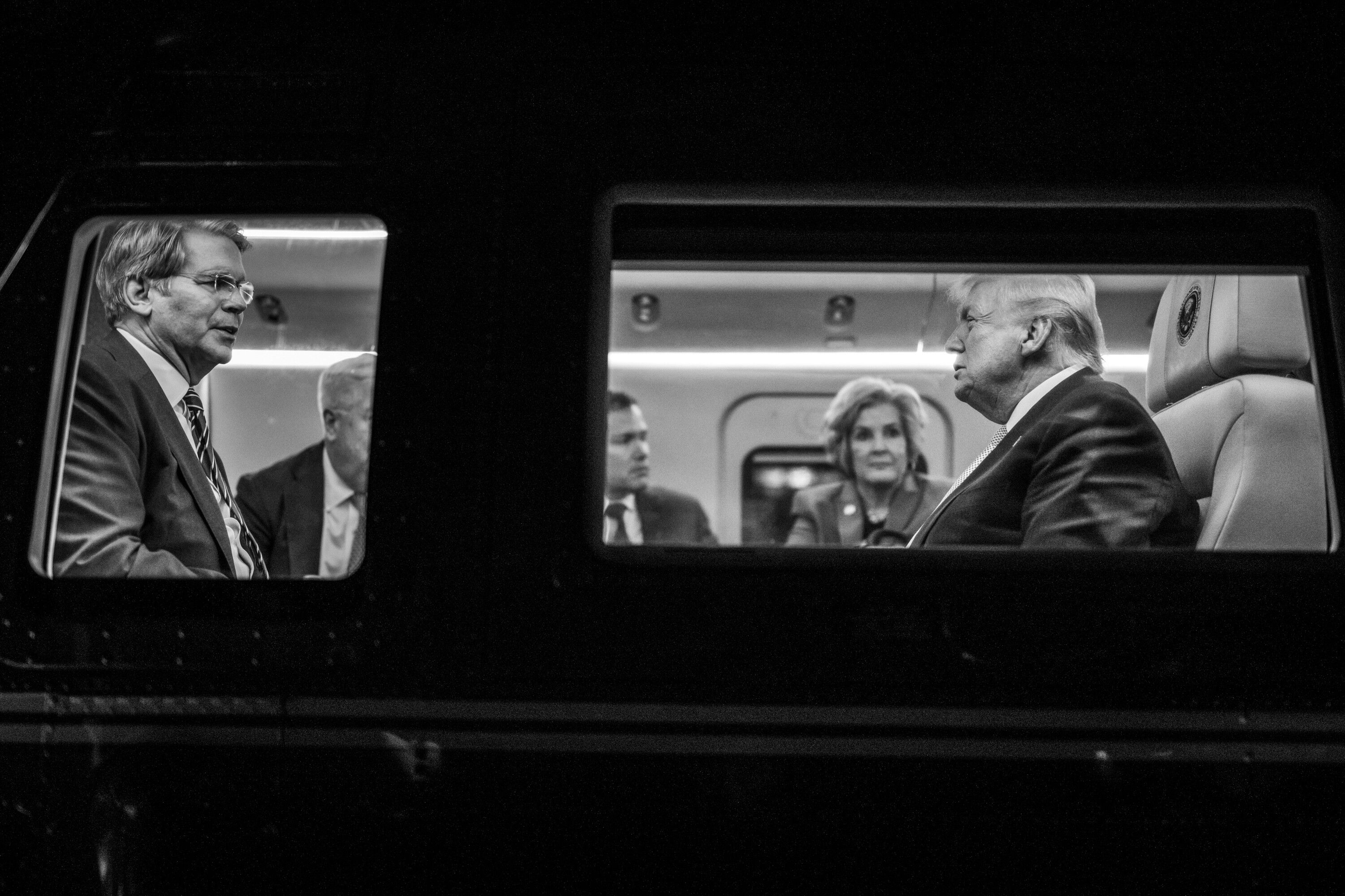 President Donald Trump speaks with Secretary of Treasury Scott Bessent, Secretary of State Marco Rubio, and Chief of Staff Susie Wiles on board Marine One at Hardy Barracks in Tokyo, Japan, Monday, October 27, 2025. (Official White House Photo by Daniel Torok)