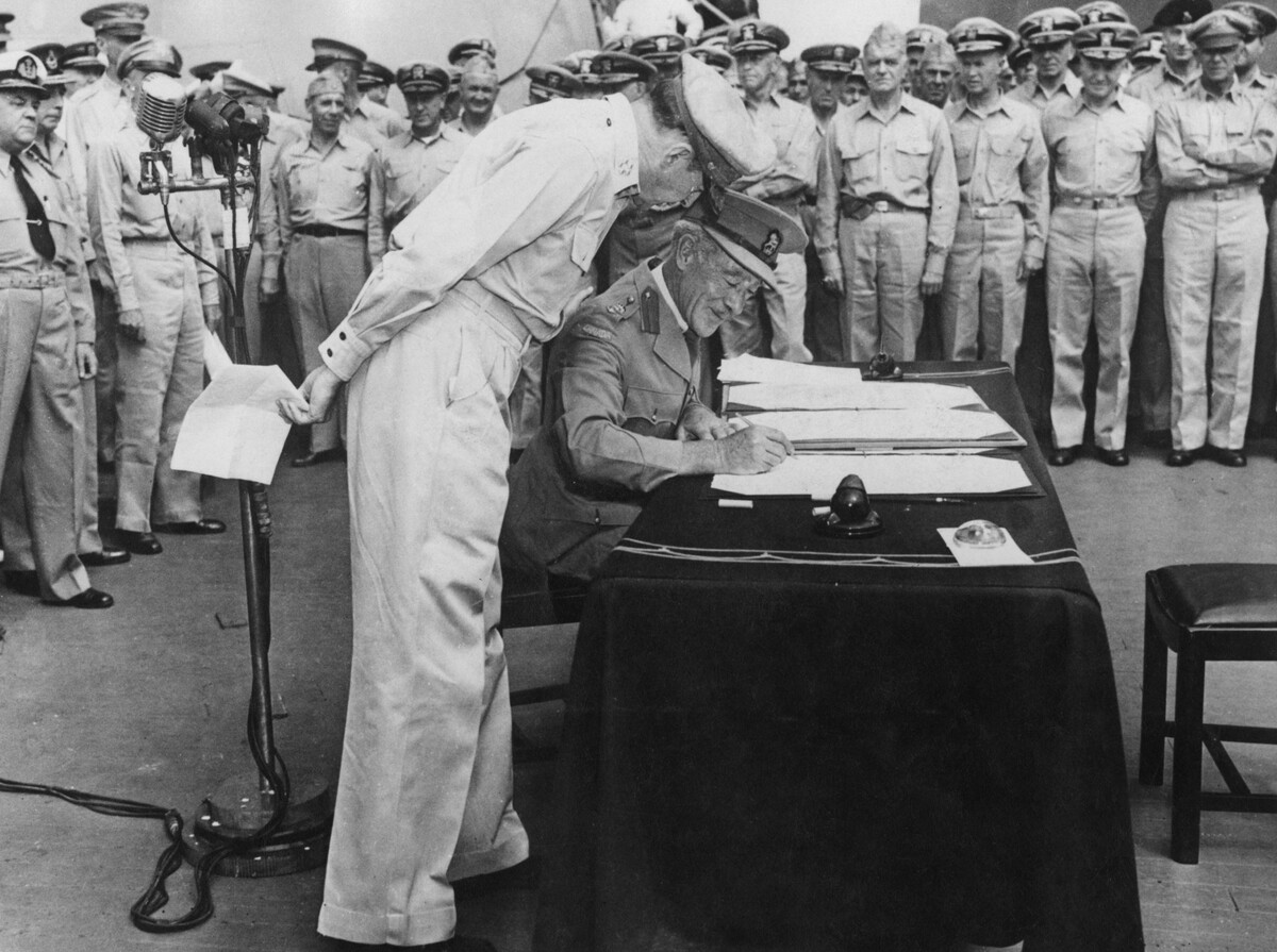 Cosgrave signing the Japanese Instrument of Surrender aboard USS Missouri