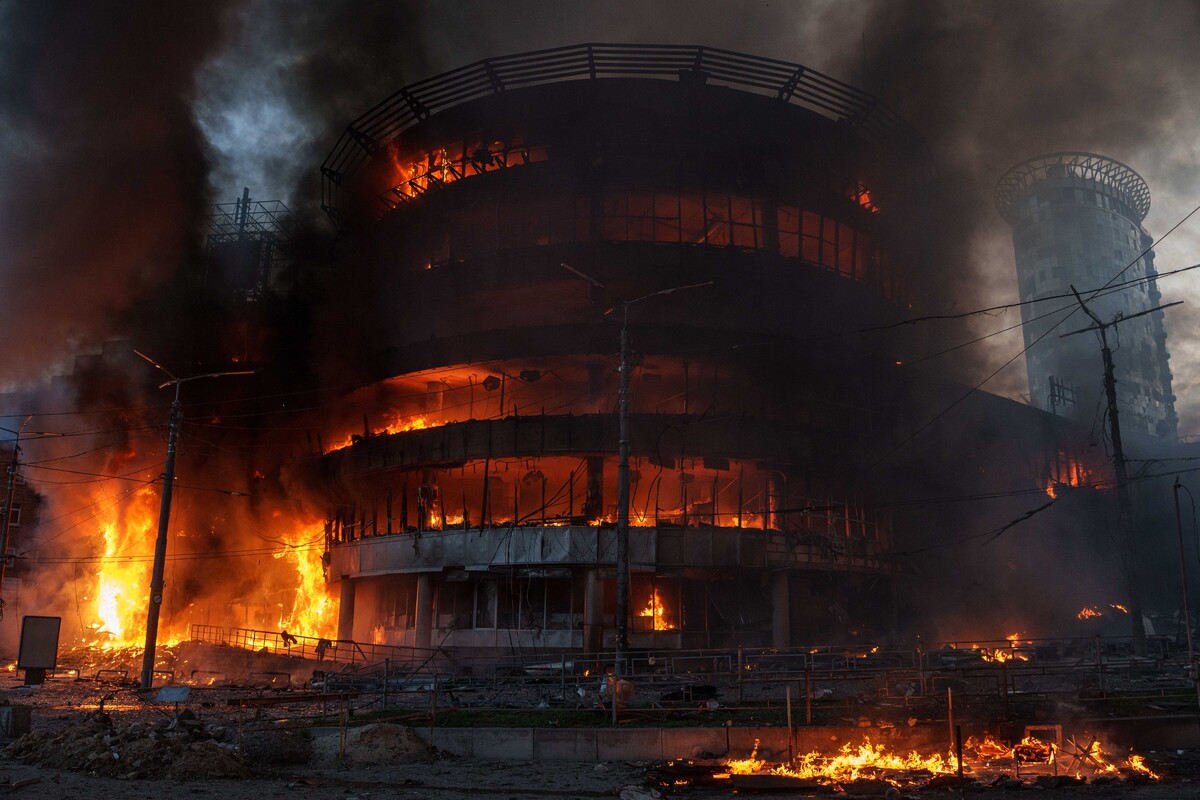 A trade center burns after a Russian strike on Kyiv, Ukraine, on Sunday, May 24, 2026. (AP Photo/Evgeniy Maloletka)