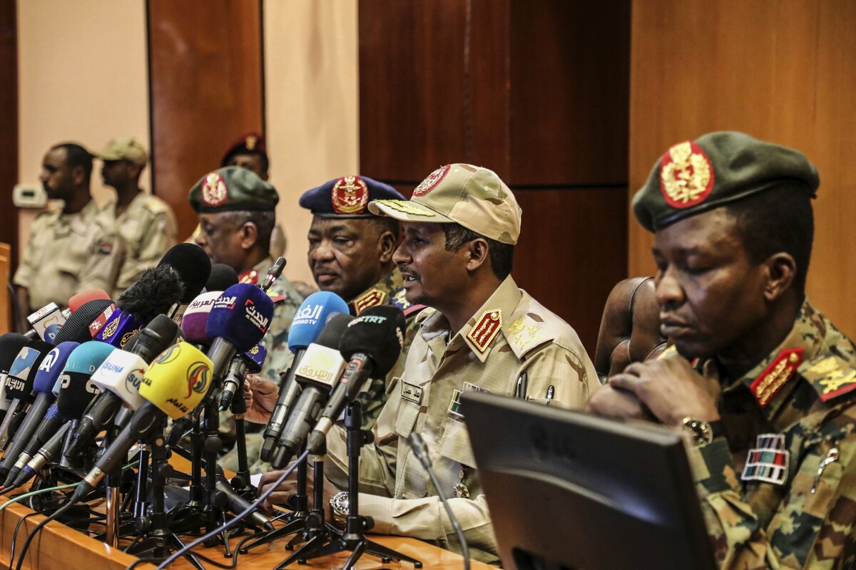 Mohamed Hamdan Dagalo, second from right, speaks at a conference in Khartoum.
