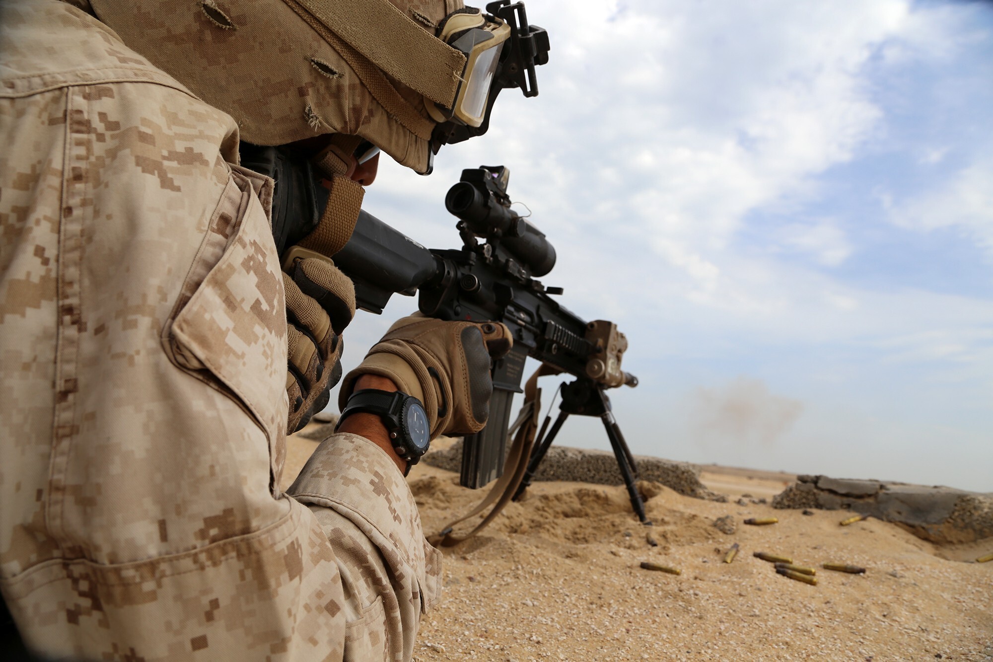 A U.S. Marine with 1st Light Armored Reconnaissance detachment, Battalion Landing Team 2nd Battalion, 1st Marines, 11th Marine Expeditionary Unit (MEU), fires his M27 individual assault rifle toward the objective area during a bilateral live-fire assault exercise with the Saudi marines as part of Red Reef 15, Ras Al Khair, Saudi Arabia, Dec. 16. The U.S. Navy has been operating in the region for more than 60 years and intends to remain in the region to support our regional partners and promote long-term regional stability and freedom of navigation. (U.S. Marine Corps photos by Gunnery Sgt. Rome M. Lazarus/Not Released)