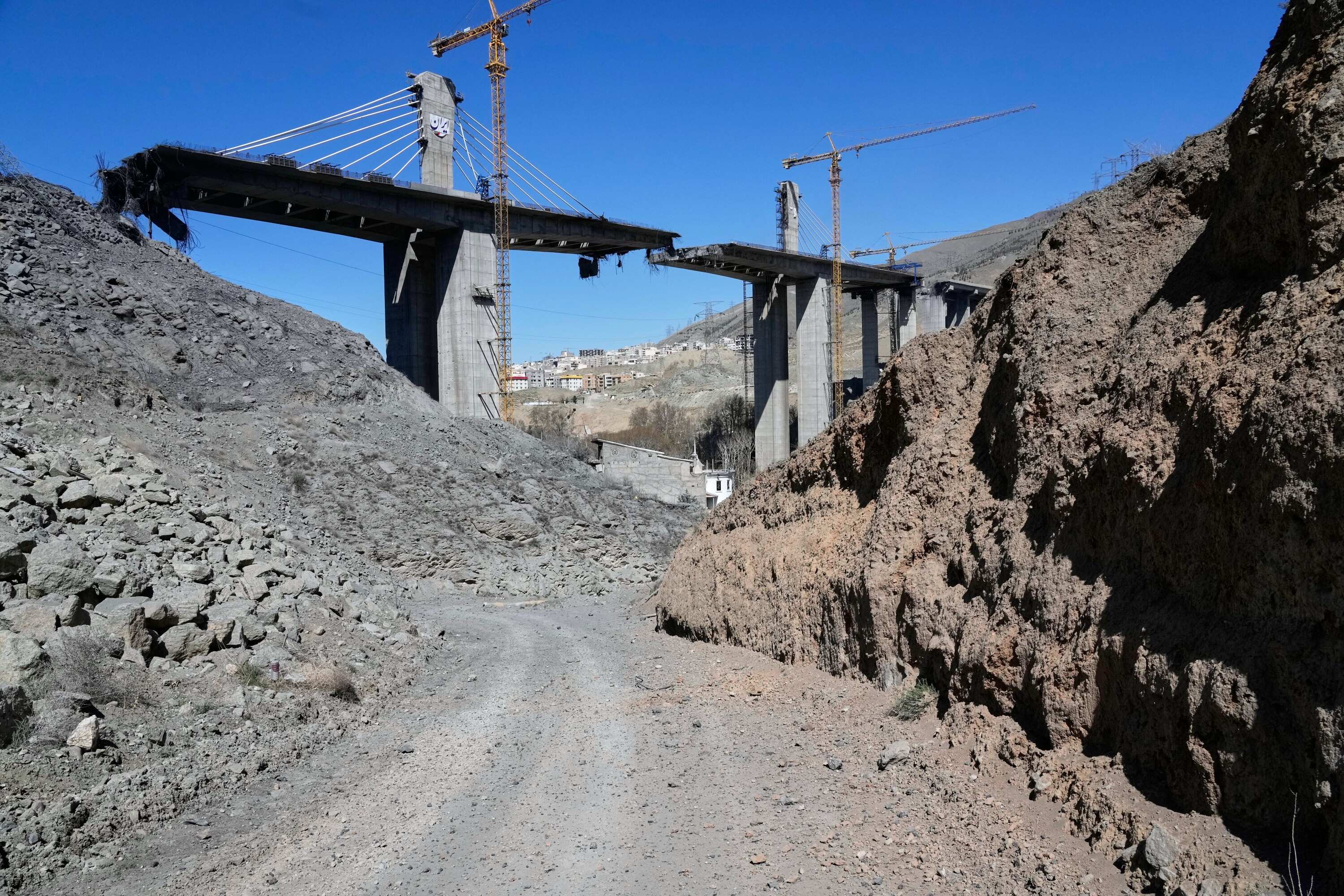 A newly constructed bridge struck by U.S. airstrikes Thursday is seen in Karaj, west of Tehran, Iran, Friday, April 3, 2026. (AP Photo/Vahid Salemi)