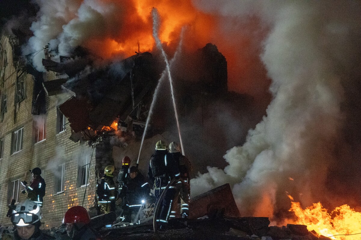 FILE - Firefighters battle a blaze in an apartment building following a Russian missile attack in Kharkiv, Ukraine, March 7, 2026. (AP Photo/Andrii Marienko, File)