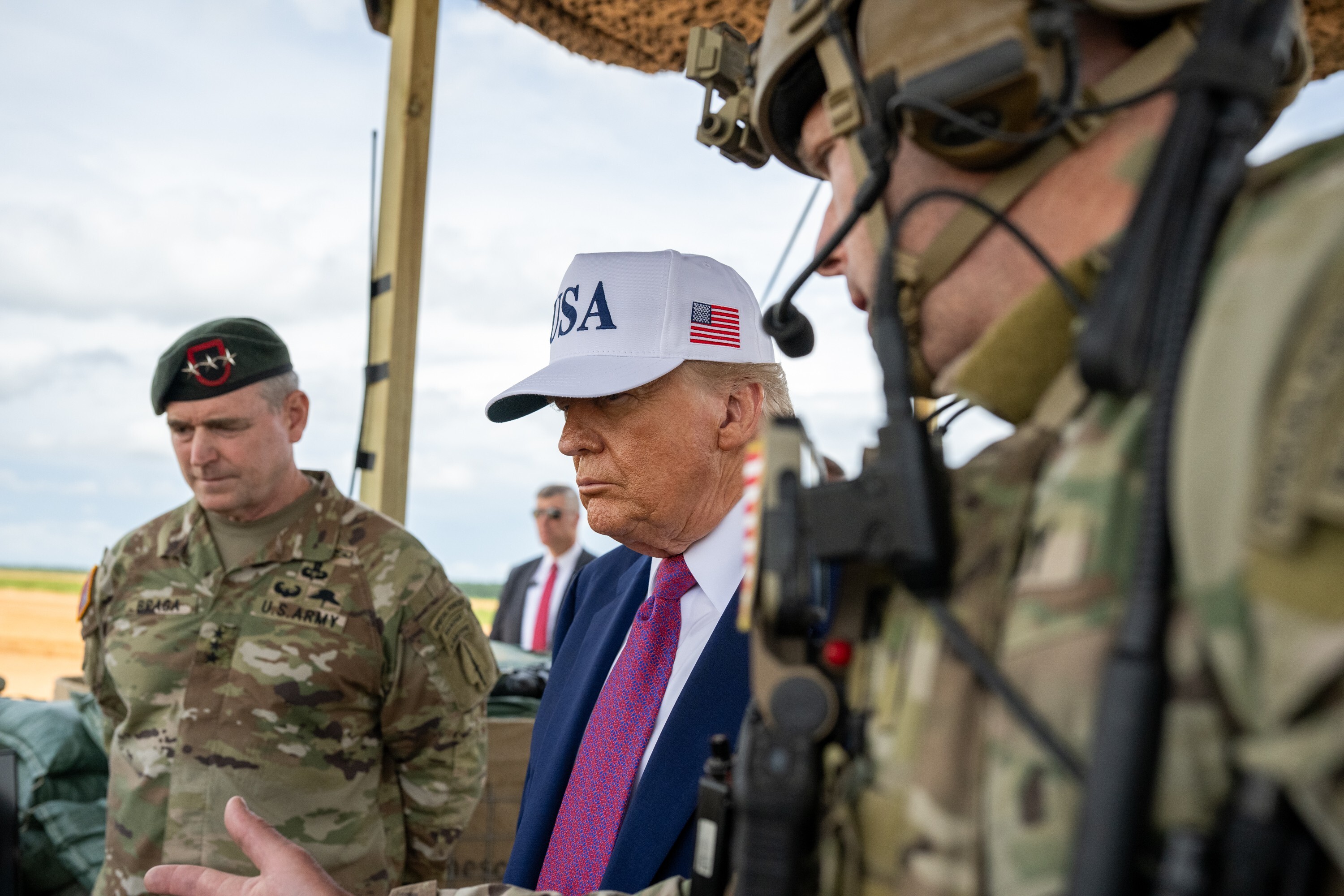 President Donald Trump observes a military demonstration at Fort Bragg, North Carolina on Tuesday, June 10, 2025, during a visit to commemorate the 250th anniversary of the U.S. Army. (Official White House Photo by Daniel Torok)