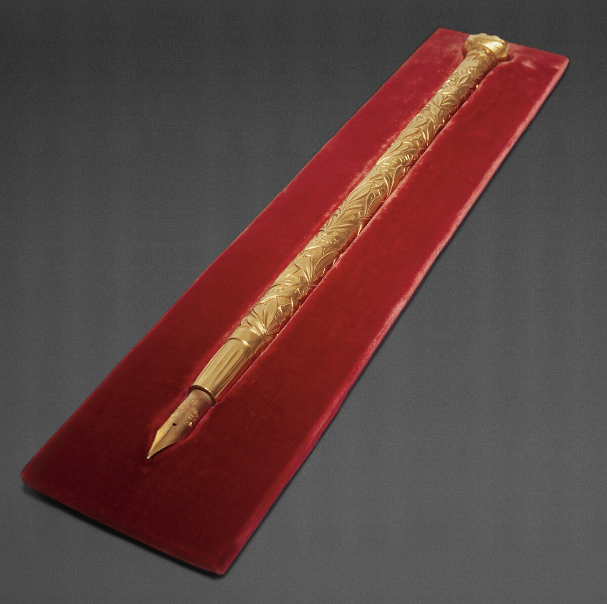Gold fountain pen used to sign the document