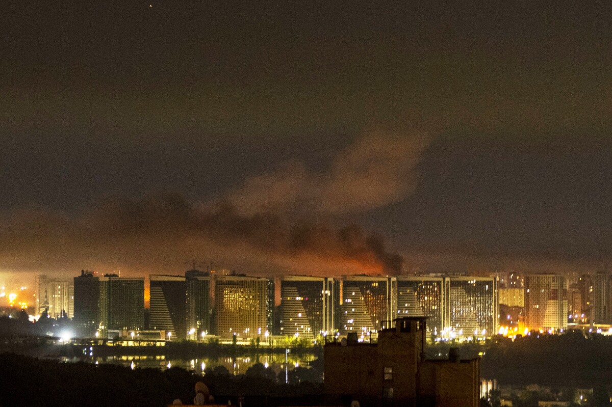Smoke rises over the city center of Kyiv, Ukraine, after a Russian missile attack Saturday, Aug. 1, 2026. (AP Photo/Dan Bashakov)