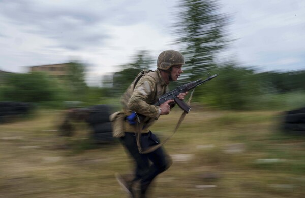 AP Photo/Evgeniy Maloletka/Guliver Image