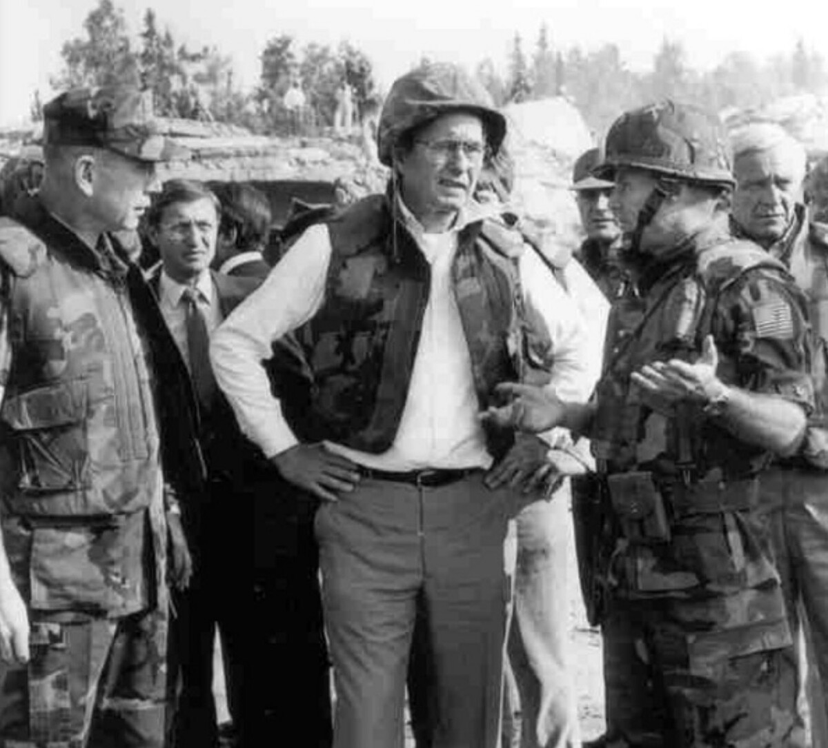 Marines escort Vice President George H. W. Bush on a tour of the bombed Beirut barracks two days after the explosion.