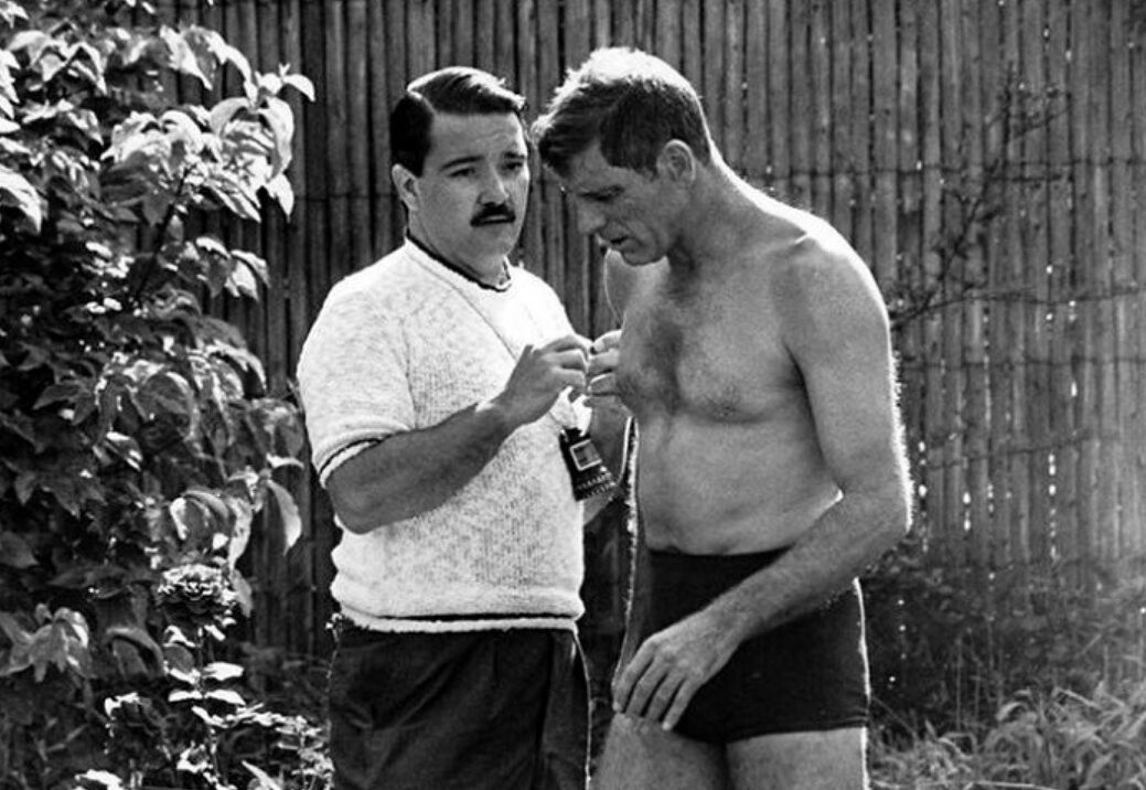 Frank Perry and Burt Lancaster on the set of "The Swimmer"