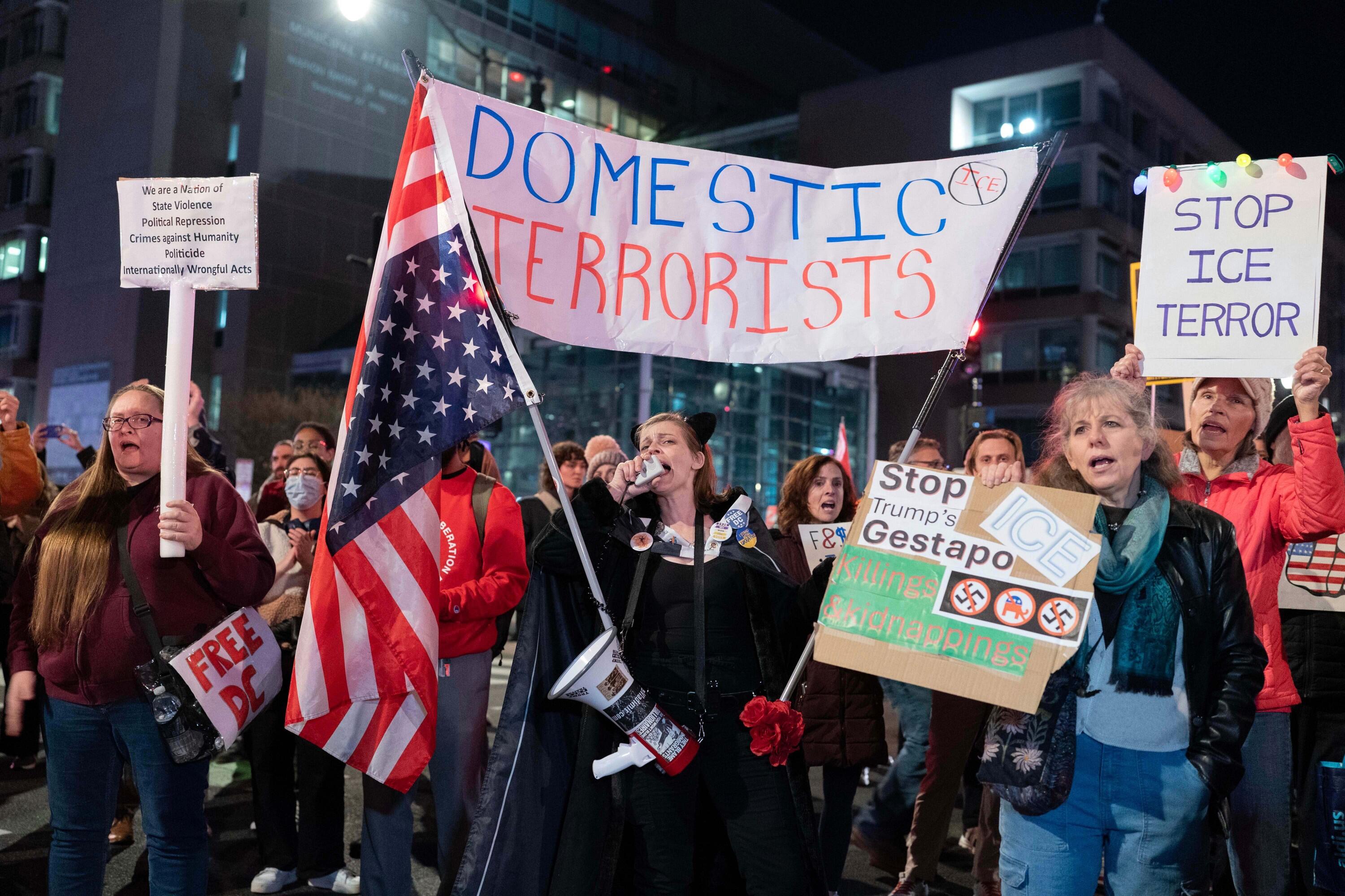 Demonstrators rally before marching to the White House in Washington, Thursday, Jan. 8, 2026, as they protest against the Immigration and Customs Enforcement (ICE) agent who fatally shot Renee Nicole Good in Minneapolis. (AP Photo/Jose Luis Magana)