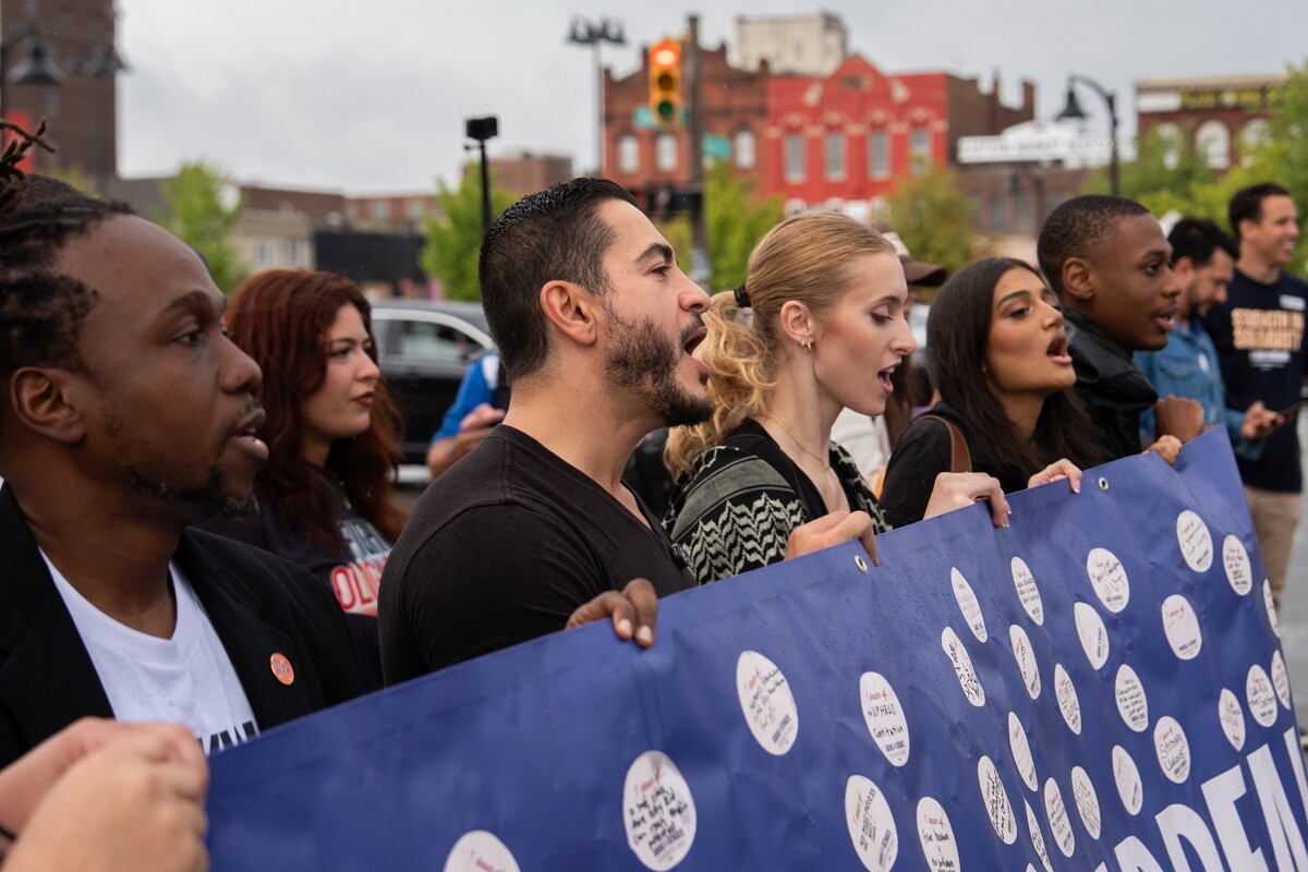 Abdul El-Sayed takes part in a march in Michigan