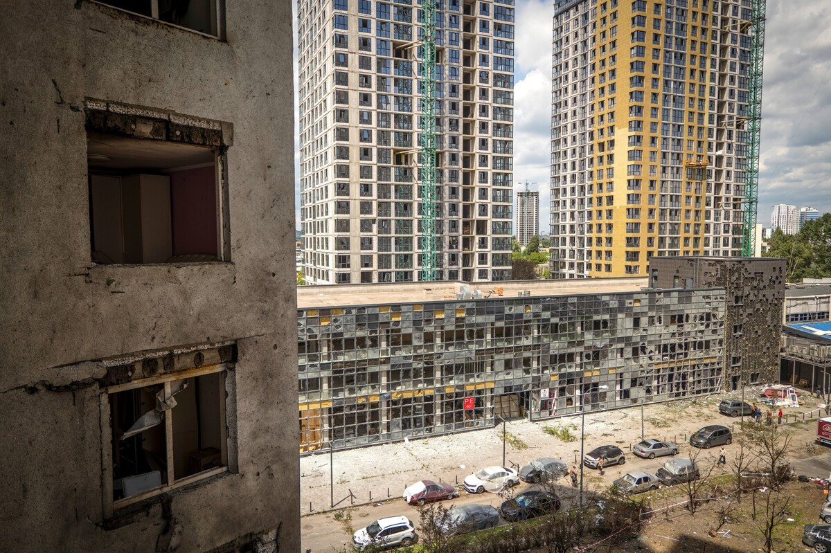 A view from destroyed flat showing the neighboring buildings damaged by Monday's Russian missile attack in Kyiv, Ukraine, Tuesday, July 7, 2026. (AP Photo/Dan Bashakov)
